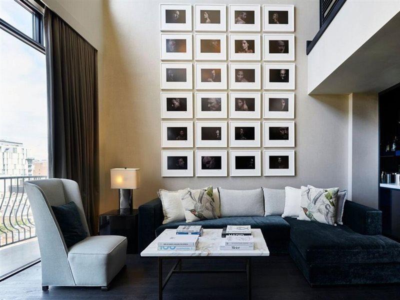 Sixty Soho Hotel New York Exterior photo A living room with a high ceiling