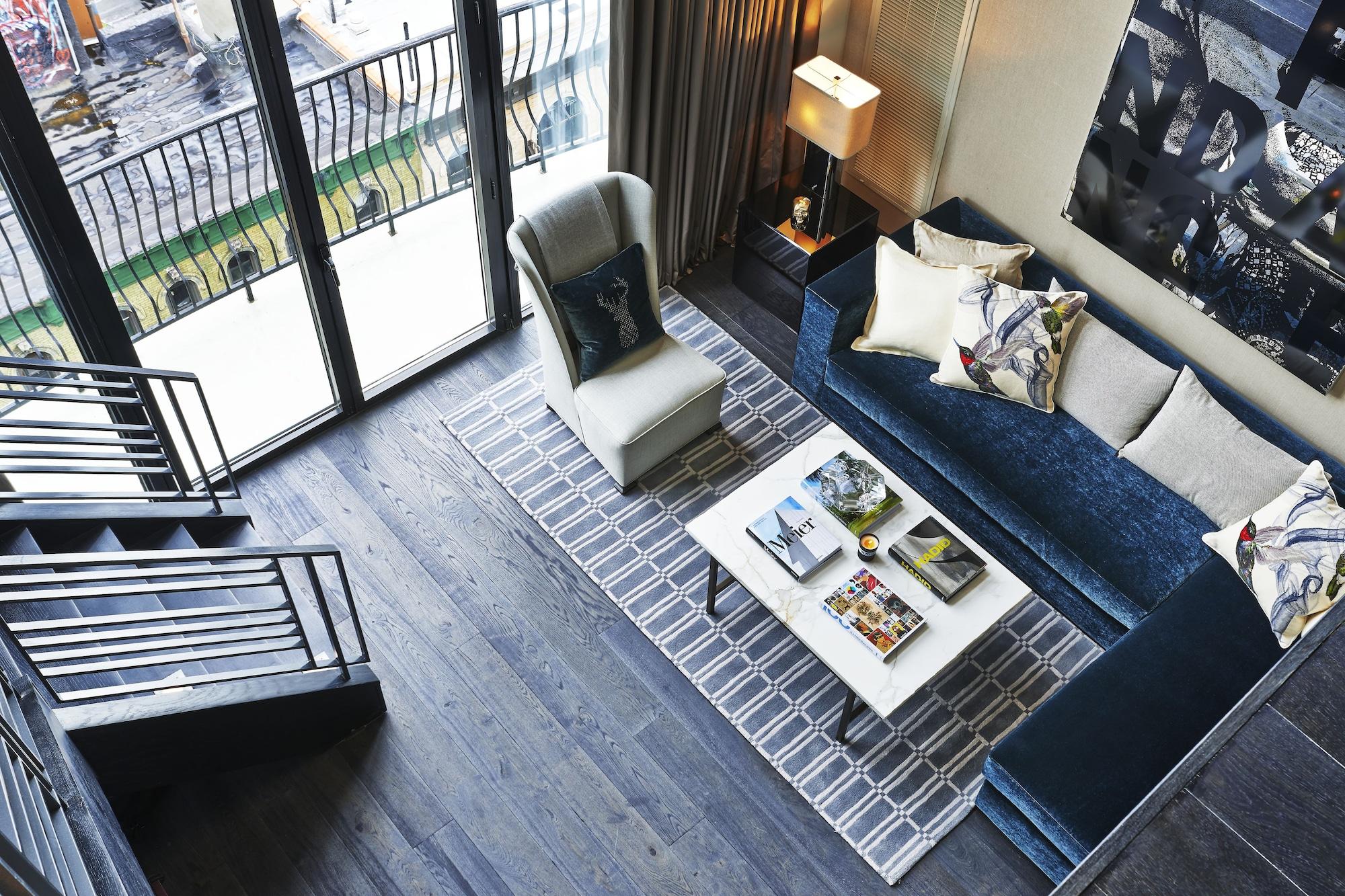 Sixty Soho Hotel New York Exterior photo A living room in a duplex apartment